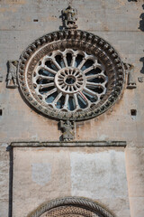 Matera, Basilicata. Rosone della Cattedrale di Maria Santissima della Bruna con sculture allusive ai punti cardinali.