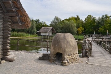 Replica of a Stone oven - medieval Stilt houses settlement at lake Constance in germany -...