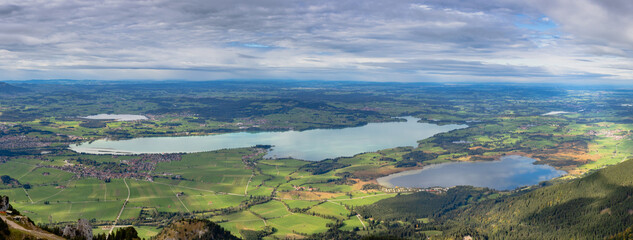 Panoramic view of the beautiful green valley with lakes. Tegelberg, Germany. © Rouven Schubert/Wirestock