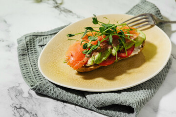 breakfast    toast with avocado and salted salmon
