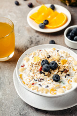 cereal muesli and cornflakes with blueberries