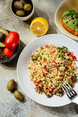 vegetarian and vegan dish bulgur tabbouleh with pepper and herbs
