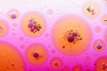 Close up macro shot of Abstract colorful Background Oil and color on water surface.
