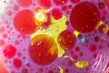 Close up macro shot of Abstract colorful Background Oil and color on water surface.