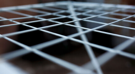 white square shapes and lines formed by an outdoor cloth air dryer 
