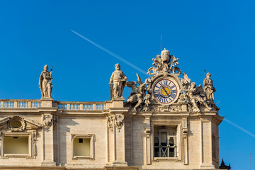 Oltramontano clock on St. Peter's Basilica in the Vatican city to show European mean time, With jet...