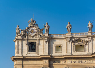Italian clock on St. Peter's Basilica in the Vatican city, showing  Rome time, Italy