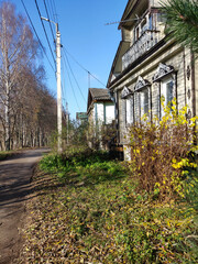View of street of Russian rural village at autumn.