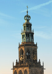 
The top of the Martini tower in Groningen, the Netherlands. Blue sky with some light clouds.
