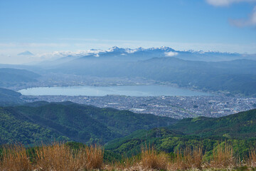 長野県　高ボッチ高原からの諏訪湖と南アルプス

