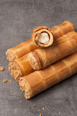 waffle tubes with cottage cheese on a gray background