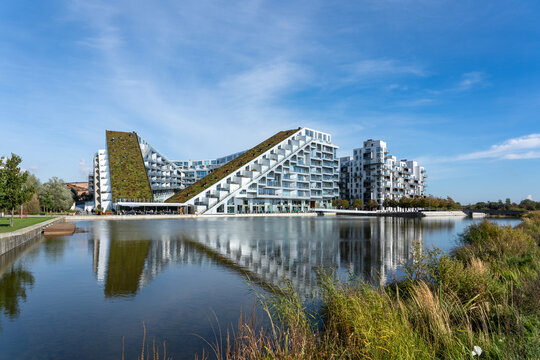 Copenhagen, Denmark - October 08, 2021: Exterior view of the 8 Housebuilding, designed by famous Danish architect Bjarke Ingels.