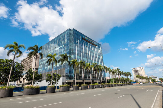Paranaque, Metro Manila, Philippines - Nov 2021: Glassy and modern mid-rise office buildings in Aseana City.