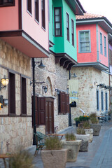 Fototapeta na wymiar beautiful colored two-story houses along the street