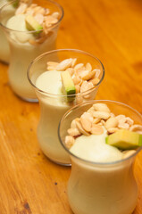 tasty vegetarian creamy avocado mousse with peanuts