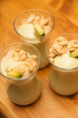 tasty vegetarian creamy avocado mousse with peanuts