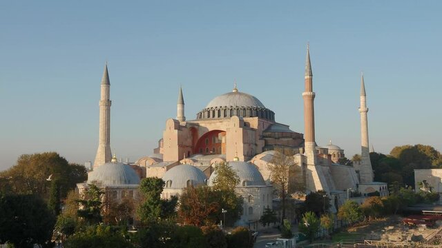 Panoramic top view of the Hagia Sophia mosque in the evening during sunset. Seagulls flying over Hagia Sophia mosque in Istanbul, Turkey. Video 4k resolution