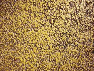 tarred surface painted with yellow paint background texture