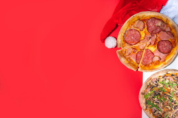 Christmas decorated background with pepperoni and mushrooms pizza, Delivery and restaurant Xmas Lunch and party menu, Santa delivers pizza for Christmas, white red modern high-colored background