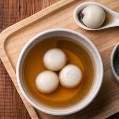 Sesame big tangyuan with syrup soup.