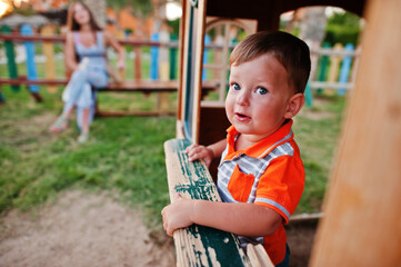 Boy at playground of egyptian resort.