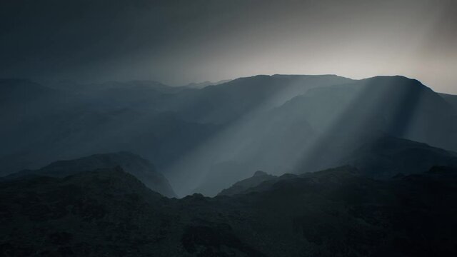 black rocky mountain silhouette in deep fog