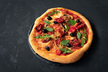 Fresh Homemade Italian Pizza with tomato and basil