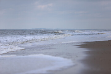 Waves of the North Sea on the beach