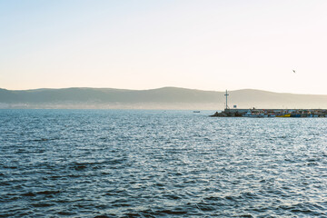 Obraz premium Sunrise sea and mountains, beautiful view. Landscape