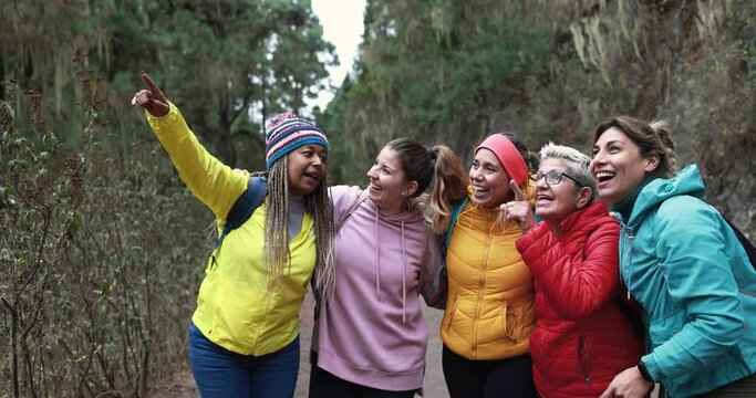 Multiracial Women Having Fun During Trekking Day In To The Wood - Multi Generational Friends Enjoy Day In Nature