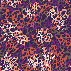 Seamless pattern made of leopard spots skin texture mixed with large colorful brush strokes background. Spotted sophisticated ornament. Fashion style. Good for wrapping, textile and fabric.
