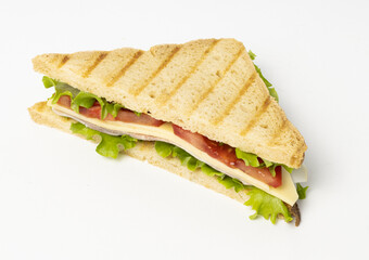 Toast bread with cheese, ham, tomatoes and salad