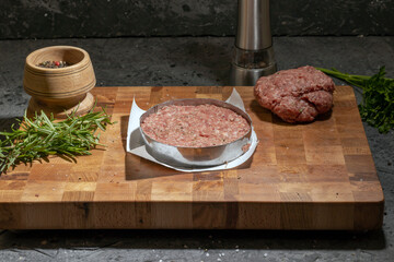 Making minced beef cutlets for a burger. View from above