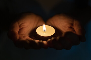 hand with candle