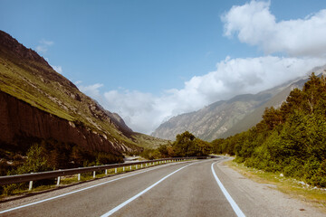 Picturesque view and open road in Elbrus area in summer.