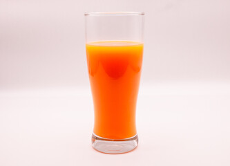 1 full glass of Orange juice isolated on white background.