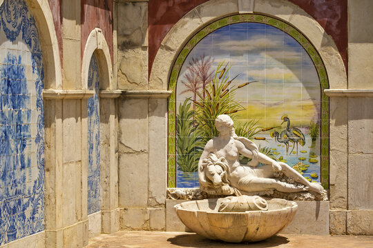 Azulejos panels in the gardens of a palace in Estoi, Algarve, Portugal