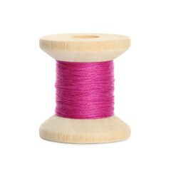 Wooden spool of bright pink sewing thread isolated on white