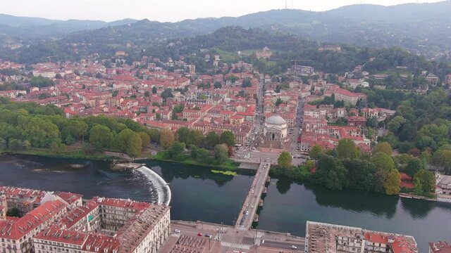 Turin: Aerial view of city in northern Italy and capital of Piedmont region in Autumn, church Chiesa della Gran Madre di Dio - landscape panorama of Europe from above