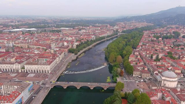 Turin: Aerial view of city in northern Italy and capital of Piedmont region in Autumn, church Chiesa della Gran Madre di Dio - landscape panorama of Europe from above