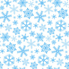 Fototapeta na wymiar Snowy winter christmas seamless pattern, blue snowflake on white background, symmetric ornament