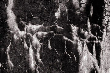 Scary destruction of concrete stone, natural wear,  corrosion with torn cracks on the surface