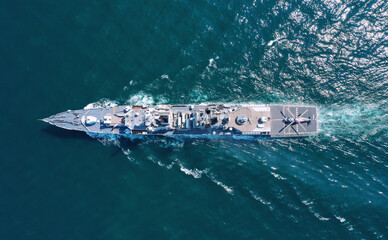 Aerial view of naval ship, battle ship, warship, Military ship resilient and armed with weapon systems, though armament on troop transports. support navy ship. Military sea transport.