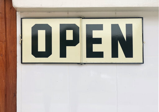 shop open sign on wall