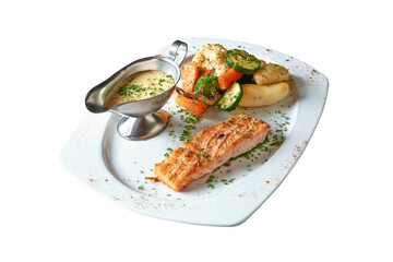 Overhead  shot of Salmon steack and bearnaise on plate.