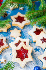 Linzer cookies. Traditional Christmas Austrian cookies with red jam sprinkled with powdered sugar on top. Copy space.