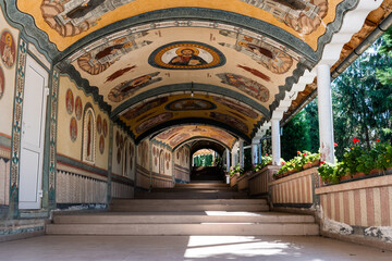 Fototapeta premium Porch inside the yard of the Holy Cross monastery. Oradea, Romania.