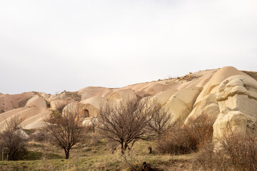 Cappadocia Turkey. Houses of local residents, dug in the sandy rocks. Dwelling of ancient people. UNESCO Monument