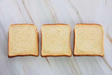 square bush of white toast bread