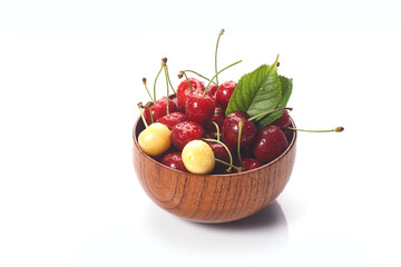 Cherry In wooden Bowl Isolated On White Background